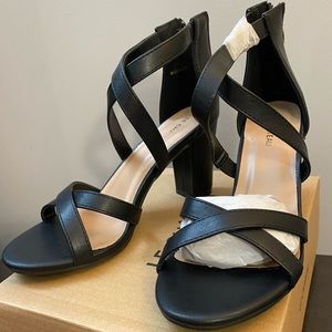 Brand new black zip strappy heals Size 8